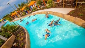 Various people enjoying the pool
